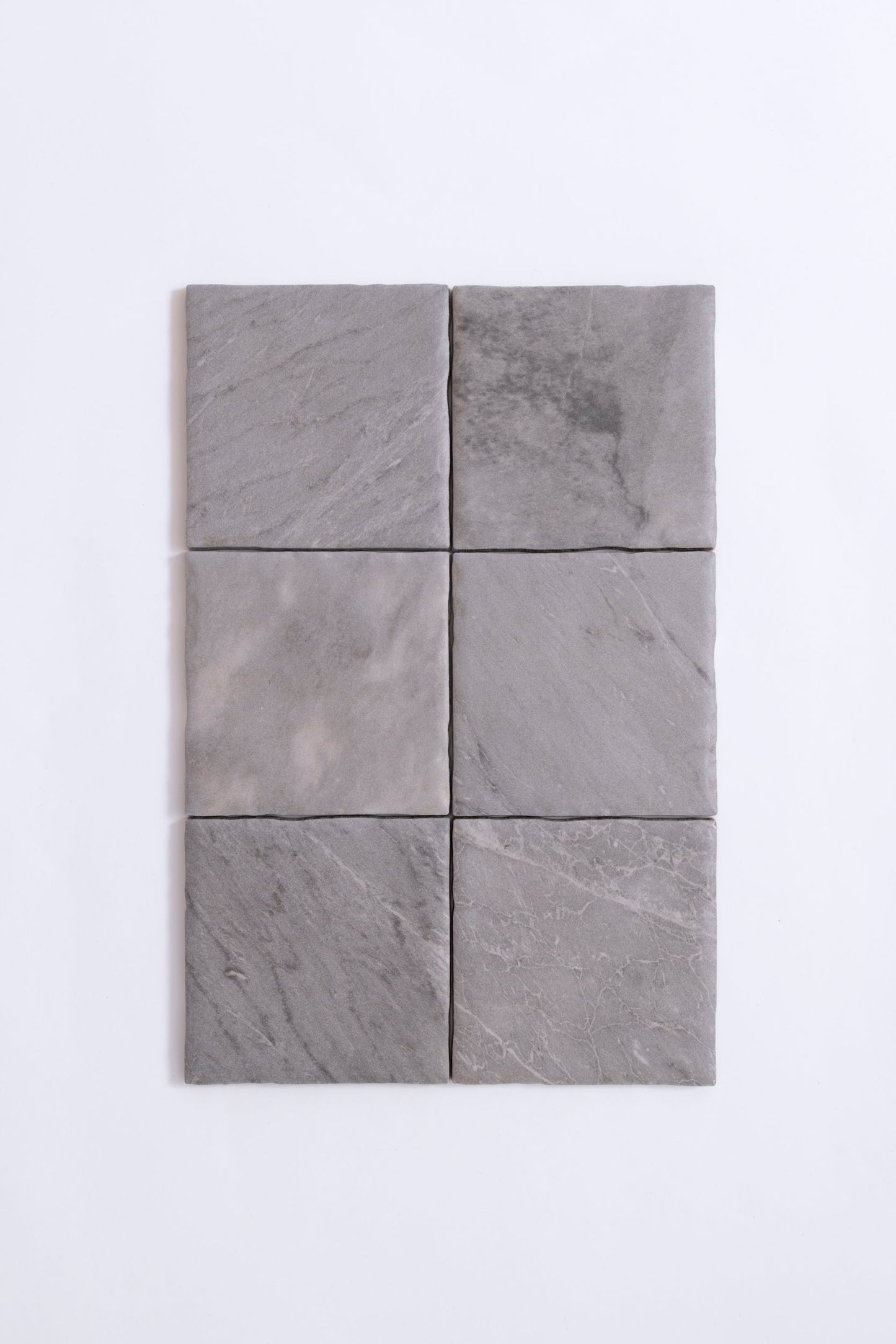 Six Tosca Bardiglio tile samples, square and gray, arranged 2 columns by 3 rows on a plain white background.