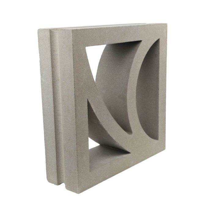 The Large Belisa by New York Cement Tile is a square mid-century screen with geometric cutouts in concrete.