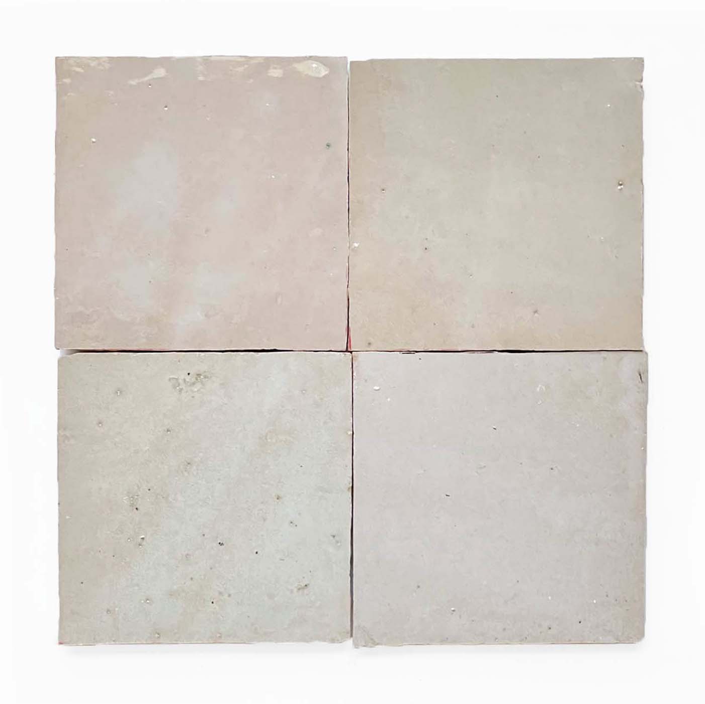 Four Blushed Glazed tiles by New York Cement Tile, light beige, arranged 2x2 on a white background.