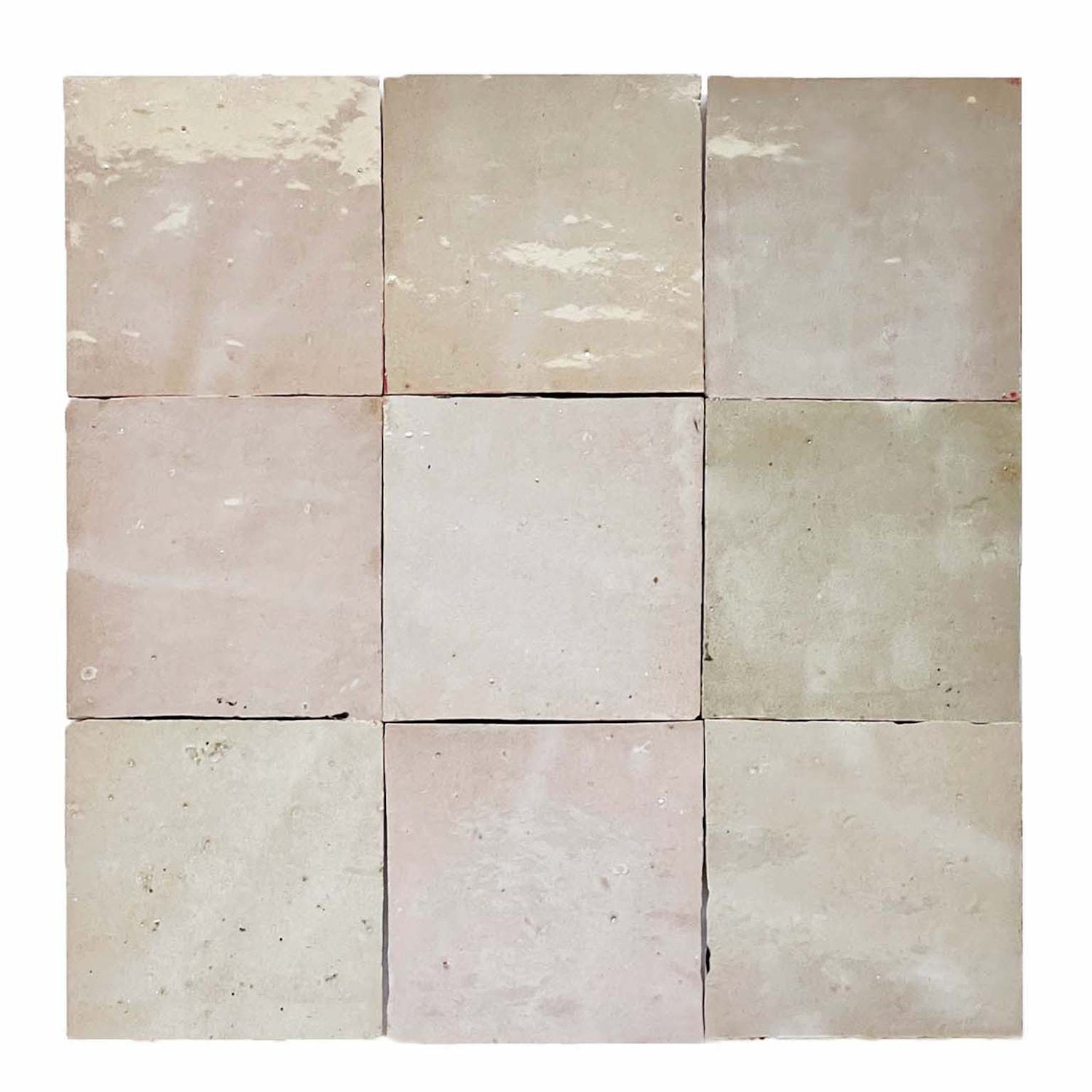 Nine Blushed Glazed 2X2 tiles by New York Cement Tile, arranged in a 3x3 grid on a white background.