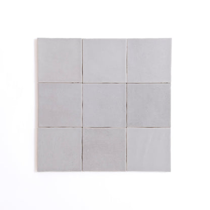 A single glossy Bourton Dark Blue tile by New York Cement Tile centered on a plain white background.