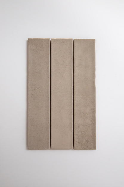 Three Buckland Beige tile samples by Cottage Ivy arranged vertically on a plain white background.