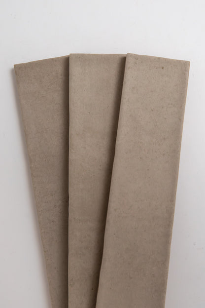 Three Buckland Beige samples by Cottage Ivy are laid side by side on a white background.