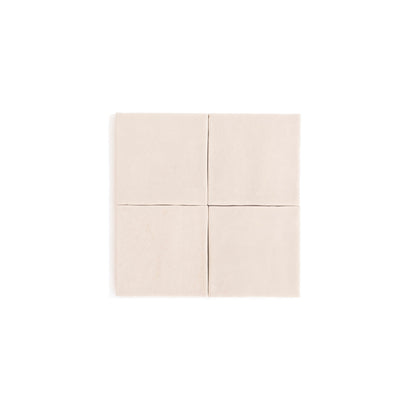 Four Buckland Beige ceramic tiles by Cottage Ivy arranged in a 2x2 grid on a white background.