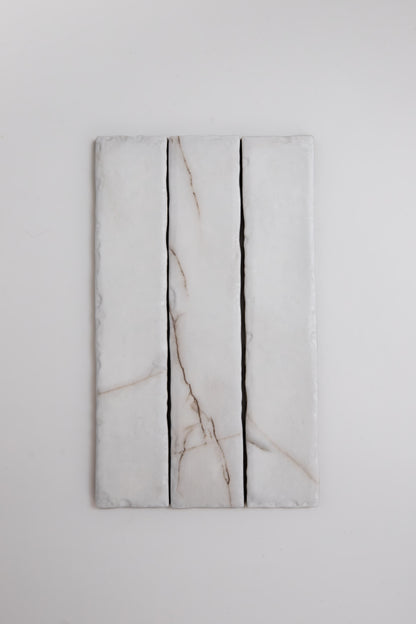 Three Calacatta Soft marble tile samples by Tosca, arranged vertically against a plain white background.