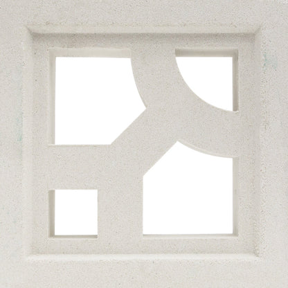 The Capri - NBB-008 Extra Sample by New York Cement Tile is a white block with geometric cutouts for stylish privacy screens.