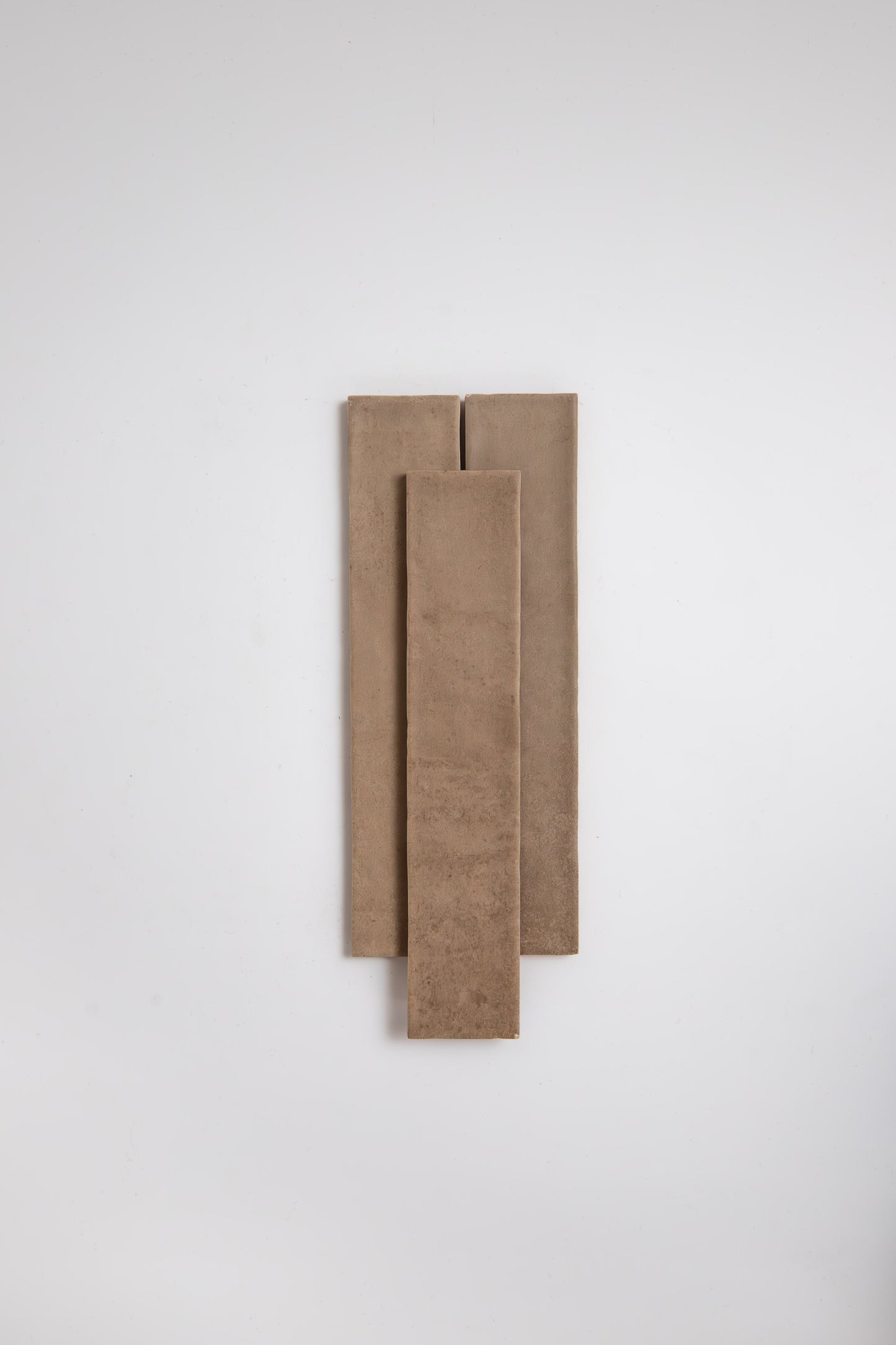 Three Castlegate Brown, Extra Sample tiles by Cottage Ivy are arranged vertically on a plain white background.