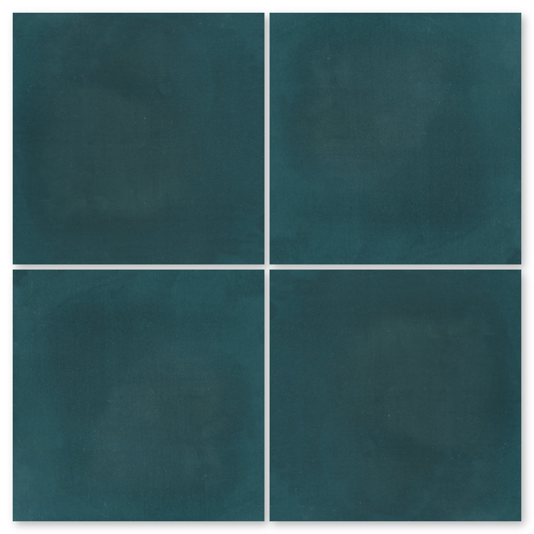 Four New York Cement Tile 4455-Solid 4x4 samples in teal, arranged in a two-by-two grid on a white background.