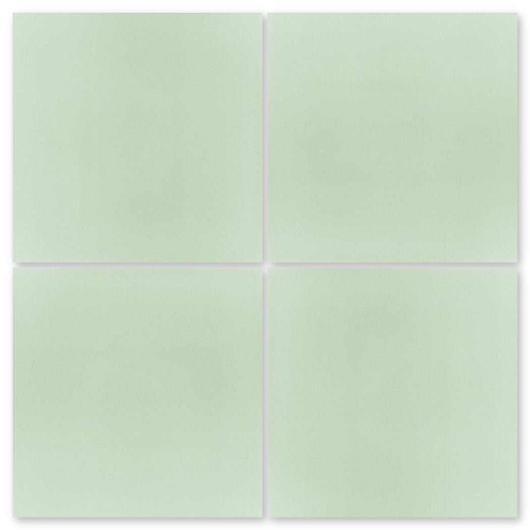 Four 4x4 Solid Light Green tiles by New York Cement Tile, arranged 2x2 with slim white gaps between each tile.