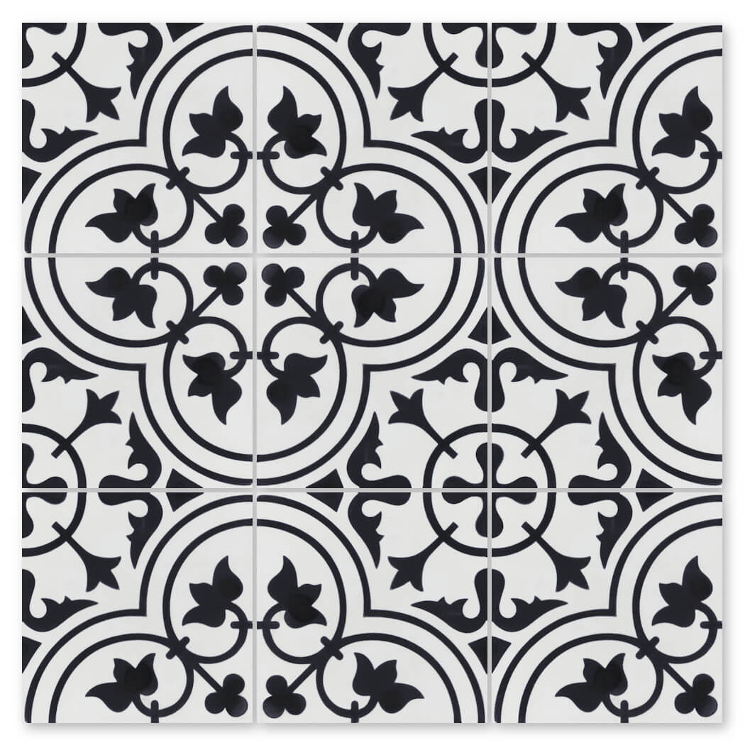 The N20-045 White sample by New York Cement Tile offers durable black and white geometric and floral patterned flooring.