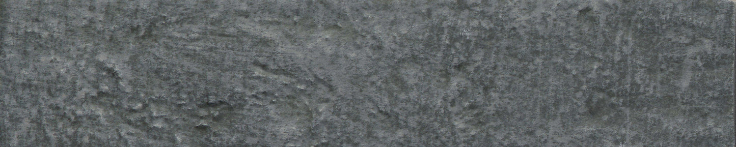 Charcoal - Brique by New York Cement Tile: textured gray stone look with natural patterns, ideal for statement walls.