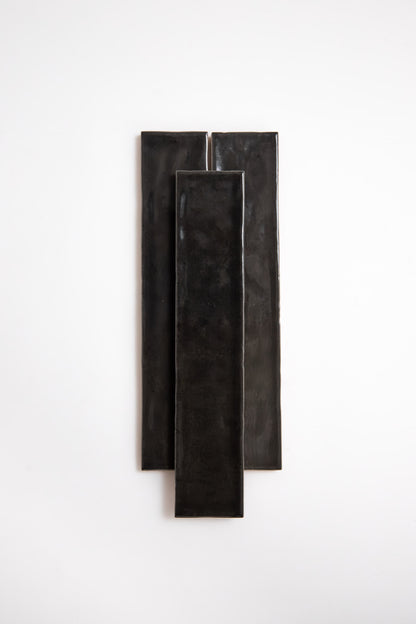 Three Cobbled Graphite tiles by Cottage Ivy are vertically arranged on a plain white background.
