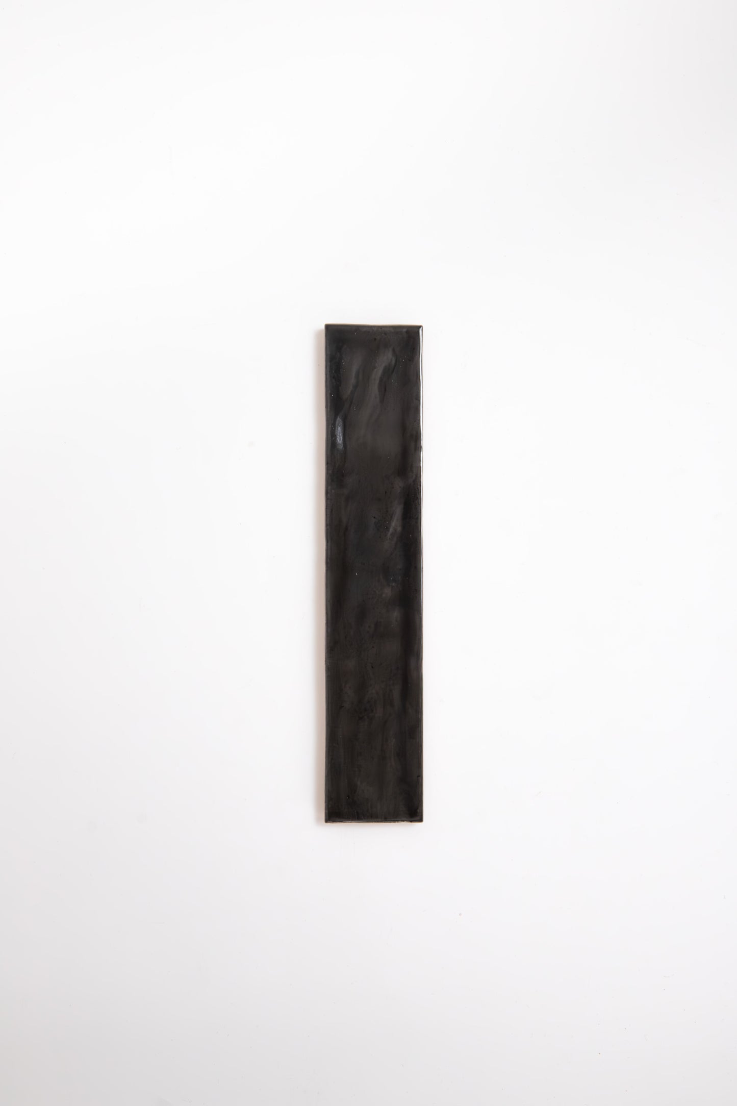 A Cobbled Graphite, Extra Sample tile by Cottage Ivy is centered on a plain white background.