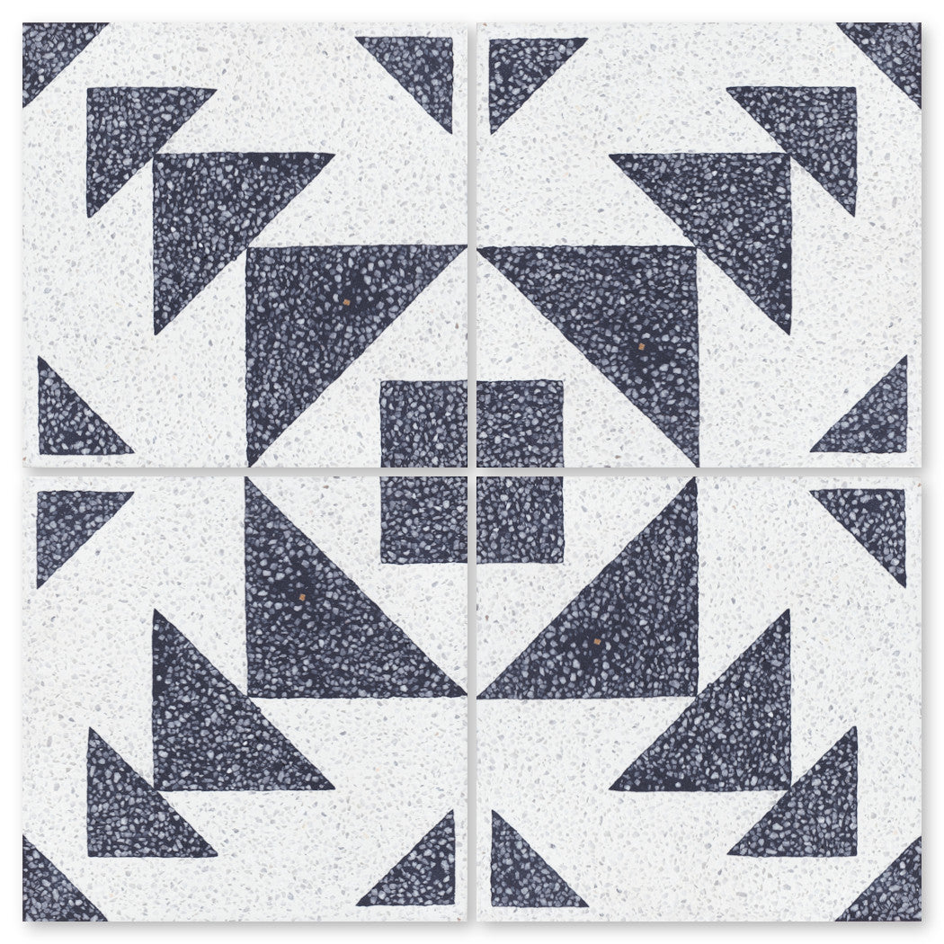 Four Terrazzo 8x8- Code Talker B tiles by New York Cement Tile show black triangles and squares on a white speckled base.