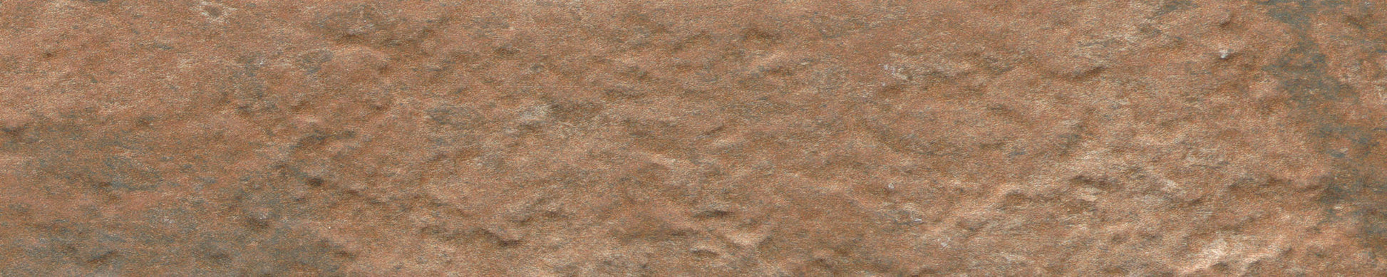Close-up of Cotto - Brique - Sample by New York Cement Tile; a rough, brique-toned texture ideal for a statement wall.