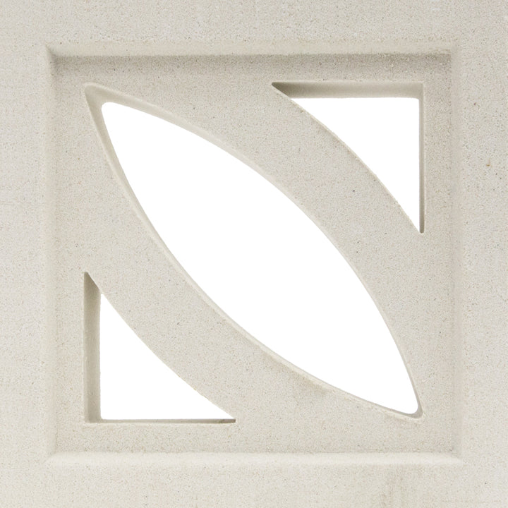 The Coz by New York Cement Tile is a square beige breeze block with diagonal cutouts for stylish, modern partitions.