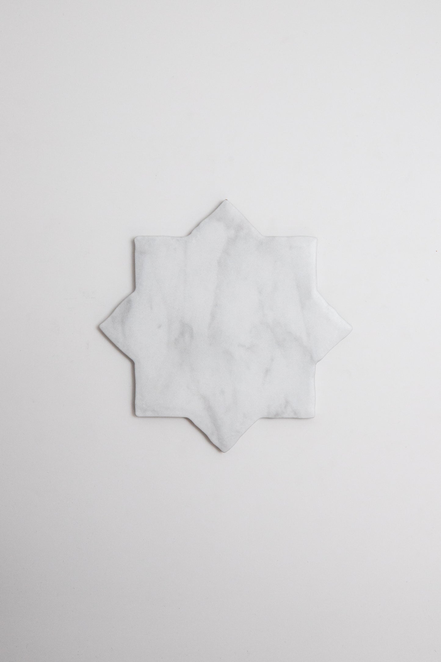 White Carrara Cross-Star, Sample