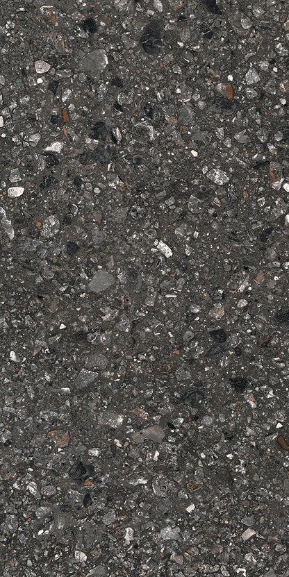 Close-up of Dye - Perenne - Sample by New York Cement Tile: dark asphalt look with stone and terrazzo textures.