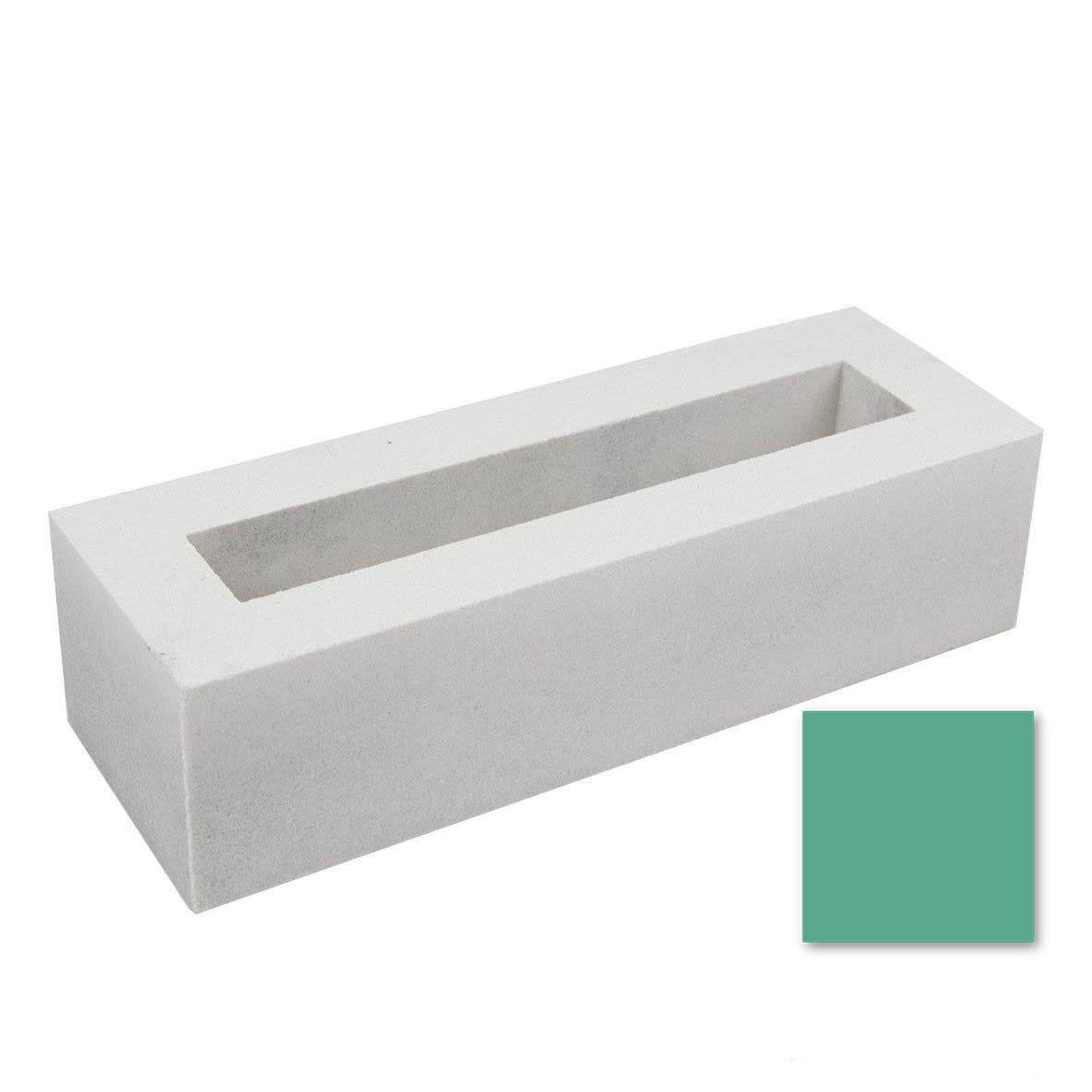A white rectangular planter box sits next to a New York Cement Tile Elb Sample in seafoam green, creating mid-century vibes.
