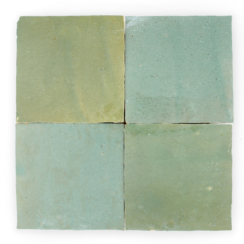 Four Leafy Green Extra Sample tiles by New York Cement Tile, arranged 2x2 on a white background.