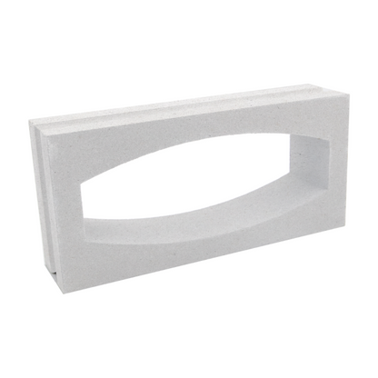 The Gili Rectangular, Extra Sample by New York Cement Tile is a white cement block with a large, curved oval opening.