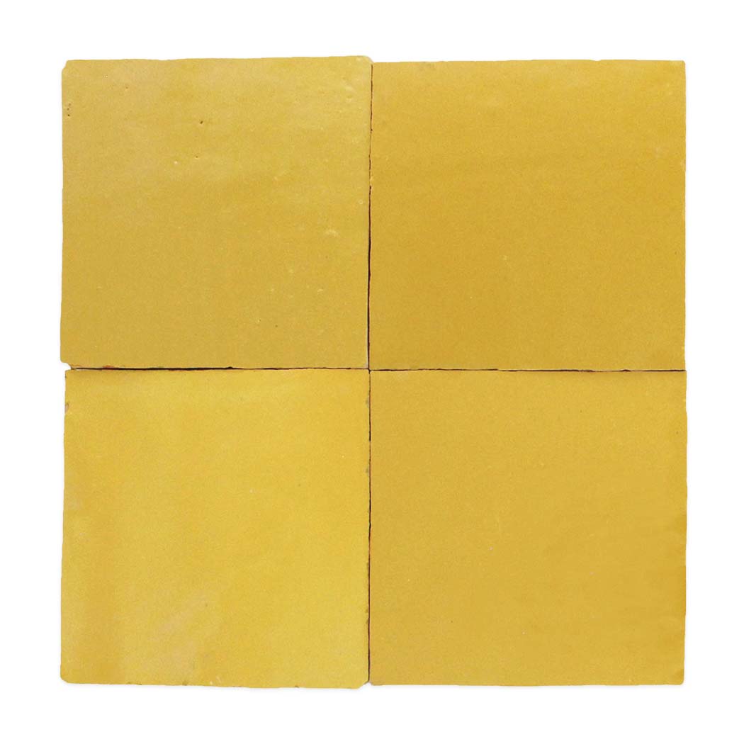 Four square yellow tiles arranged in a 2x2 grid on a white background.