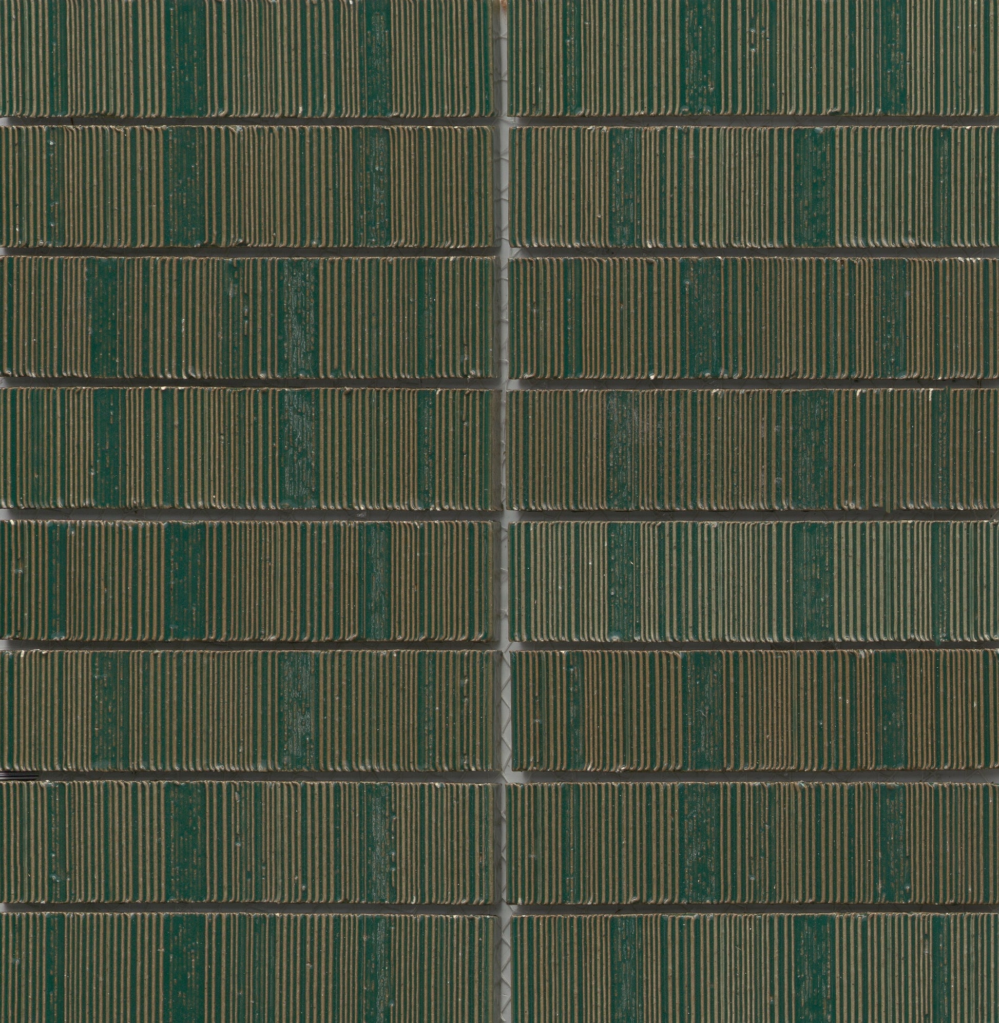 Aerial view of Green - Newtro - Sample tiles by New York Cement Tile, with geometric rows split by a central path.