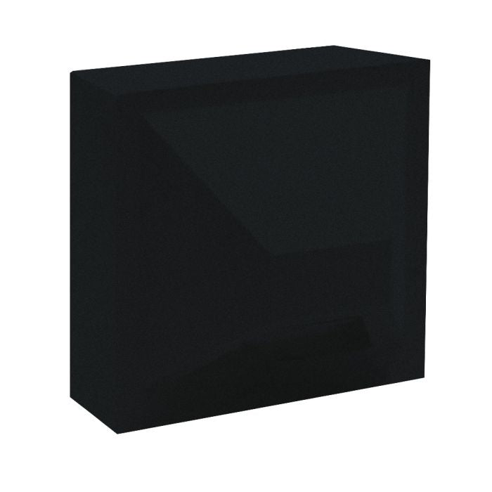 The Hawa Sample by New York Cement Tile is a solid black rectangular block with sharp, mid-century modern edges.