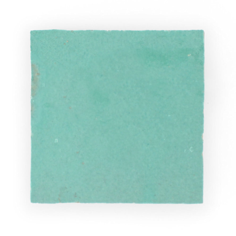 Seafoam by New York Cement Tile: a square teal handcrafted tile with a smooth matte surface on white.