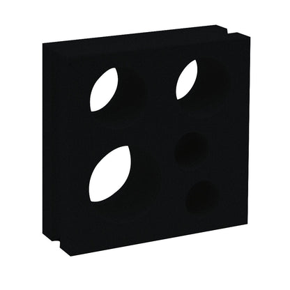 The Jamaica - NBB-015 Extra Sample by New York Cement Tile is a black breeze block with ovals and circles for stylish walls.