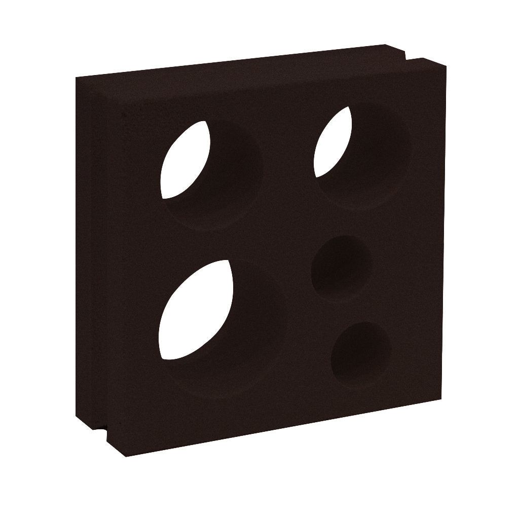 Jami by New York Cement Tile: a black rectangular foam block with four circular holes in a grid, inspired by breeze blocks.