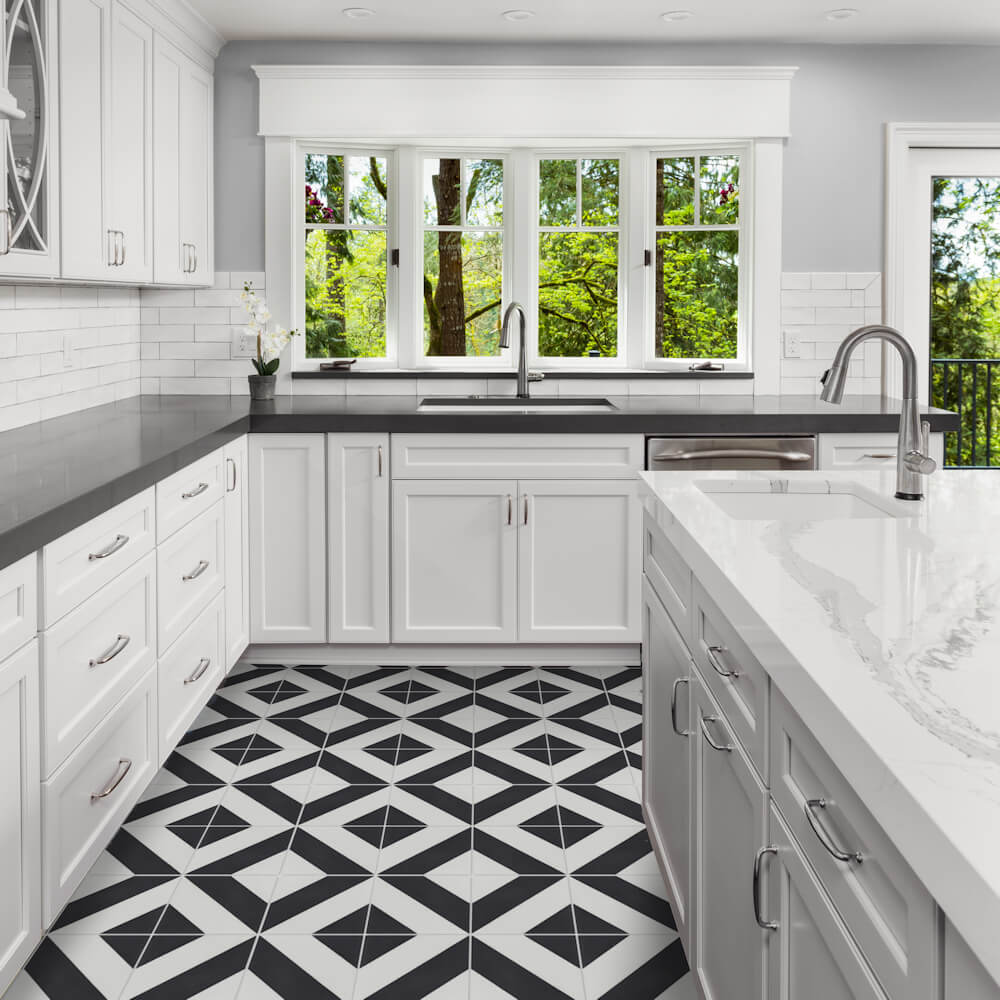 Modern white kitchen with N20-215 B&N tiles by New York Cement Tile, large windows, and sleek stainless fixtures.