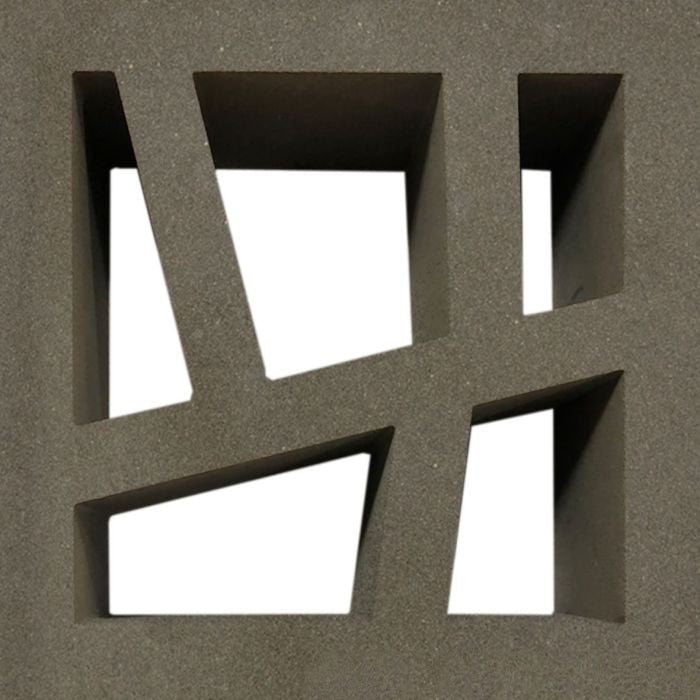 The Large Kyush by New York Cement Tile features four irregular cutouts, reflecting mid-century modern design.
