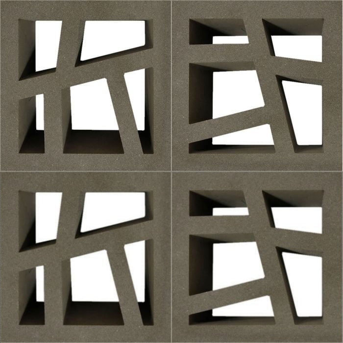 Four Large Kyush gray blocks by New York Cement Tile, in a grid with cutouts, evoke mid-century style on white.