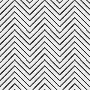 The N20-437 B&W by New York Cement Tile features black and white chevron tiles in a durable, geometric pattern.