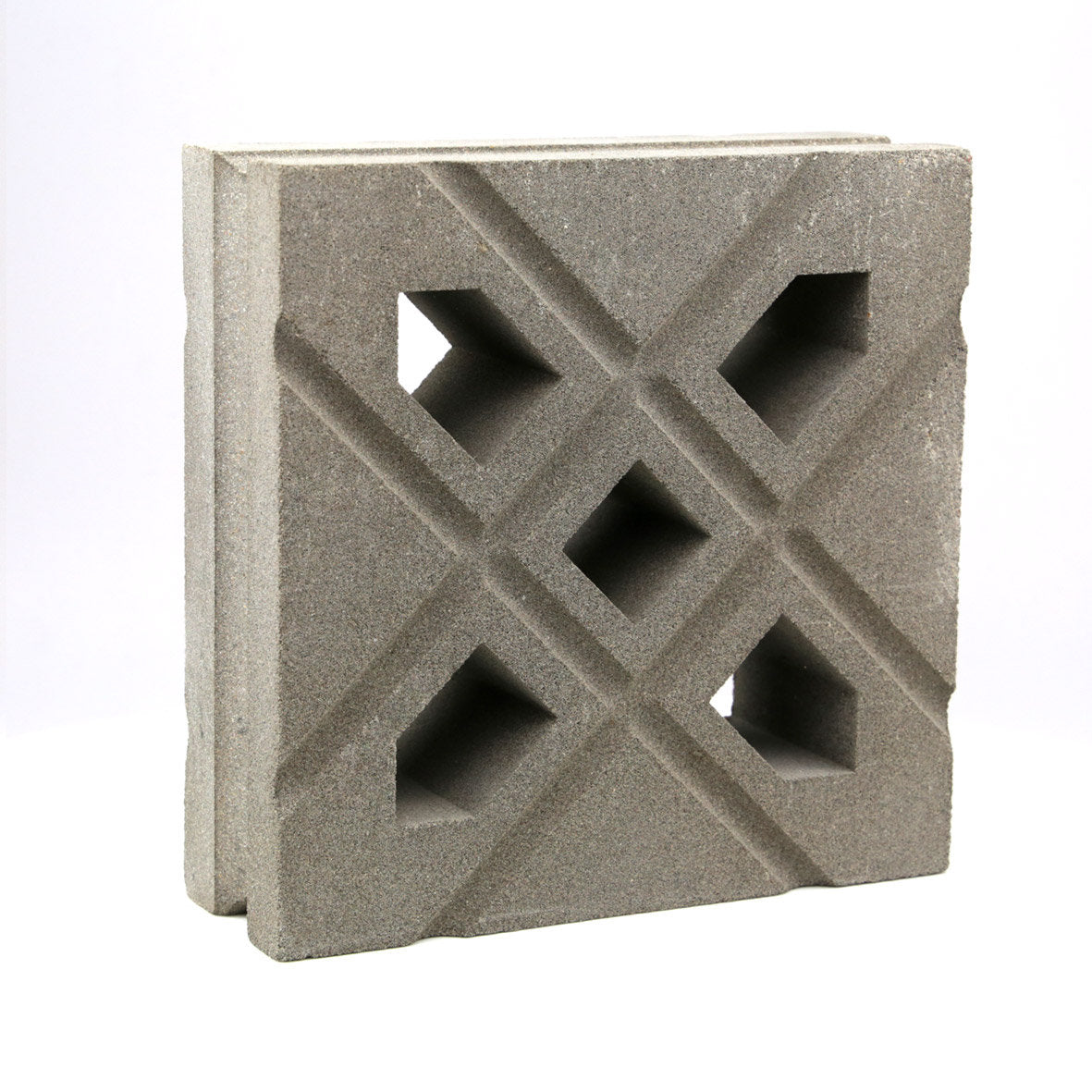 Lana by New York Cement Tile: a square concrete breeze block with geometric cutouts, perfect for decorative partitions.