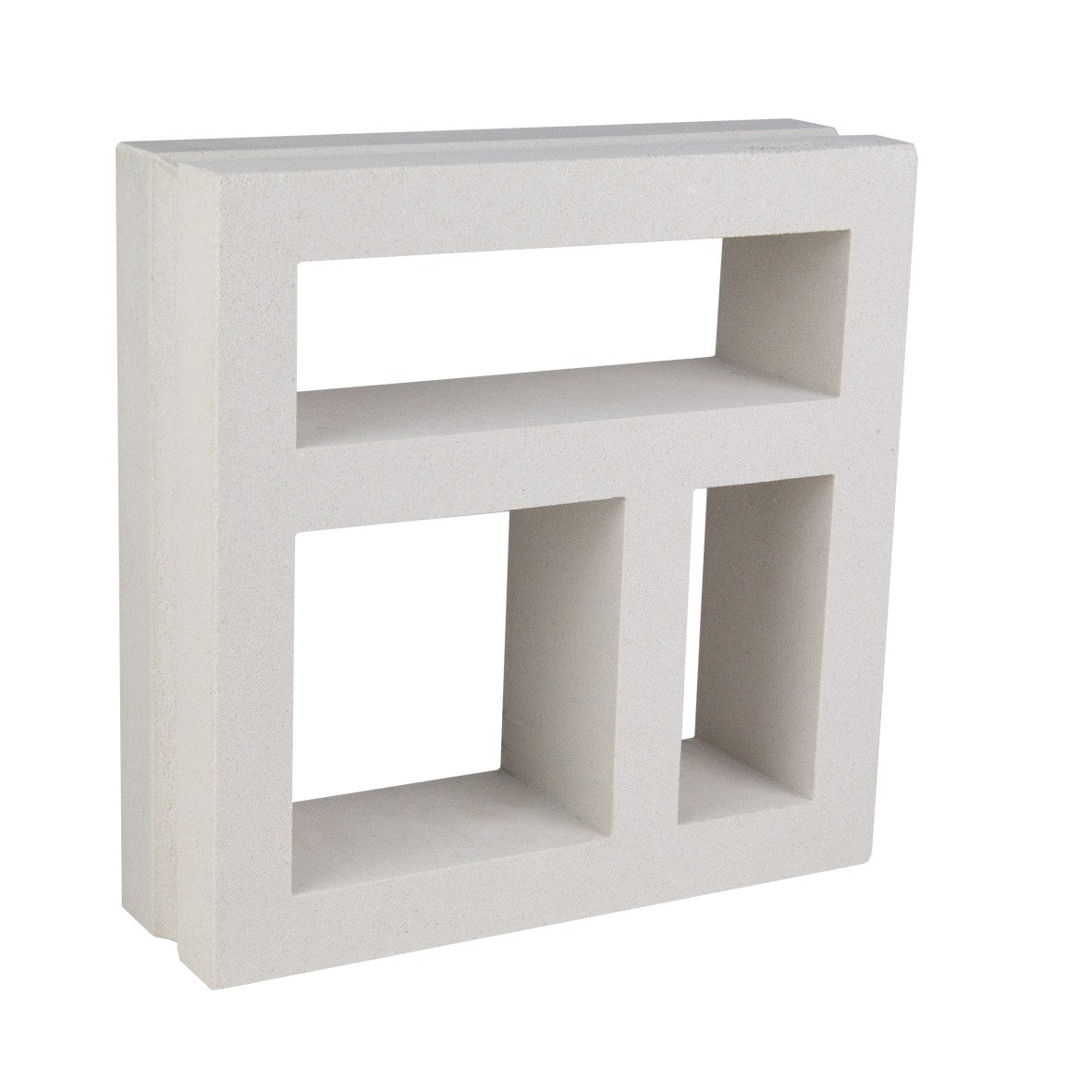 The Large Kaua Sample by New York Cement Tile is a white concrete breeze block with three rectangular openings for décor.