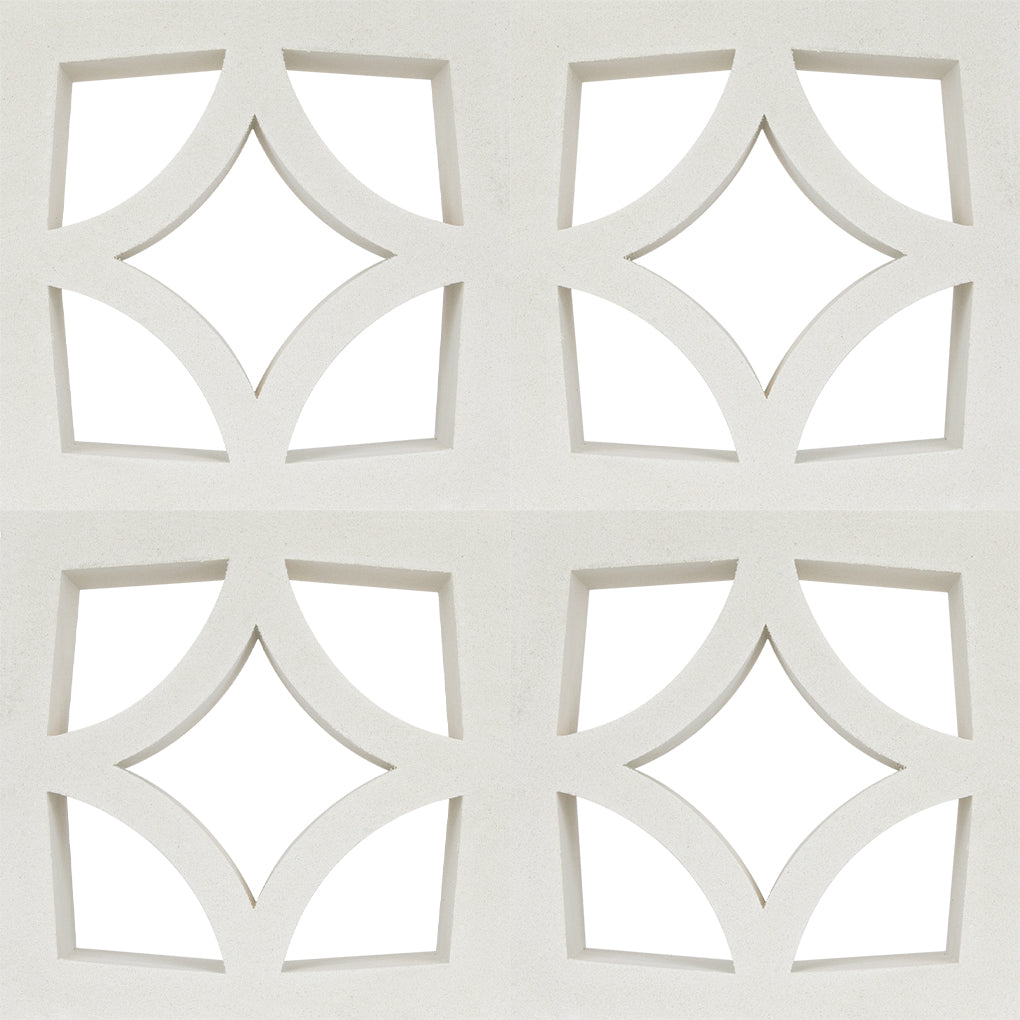 Four Large Malta tiles by New York Cement Tile create a concrete screen with geometric diamonds and curved mid-century patterns.
