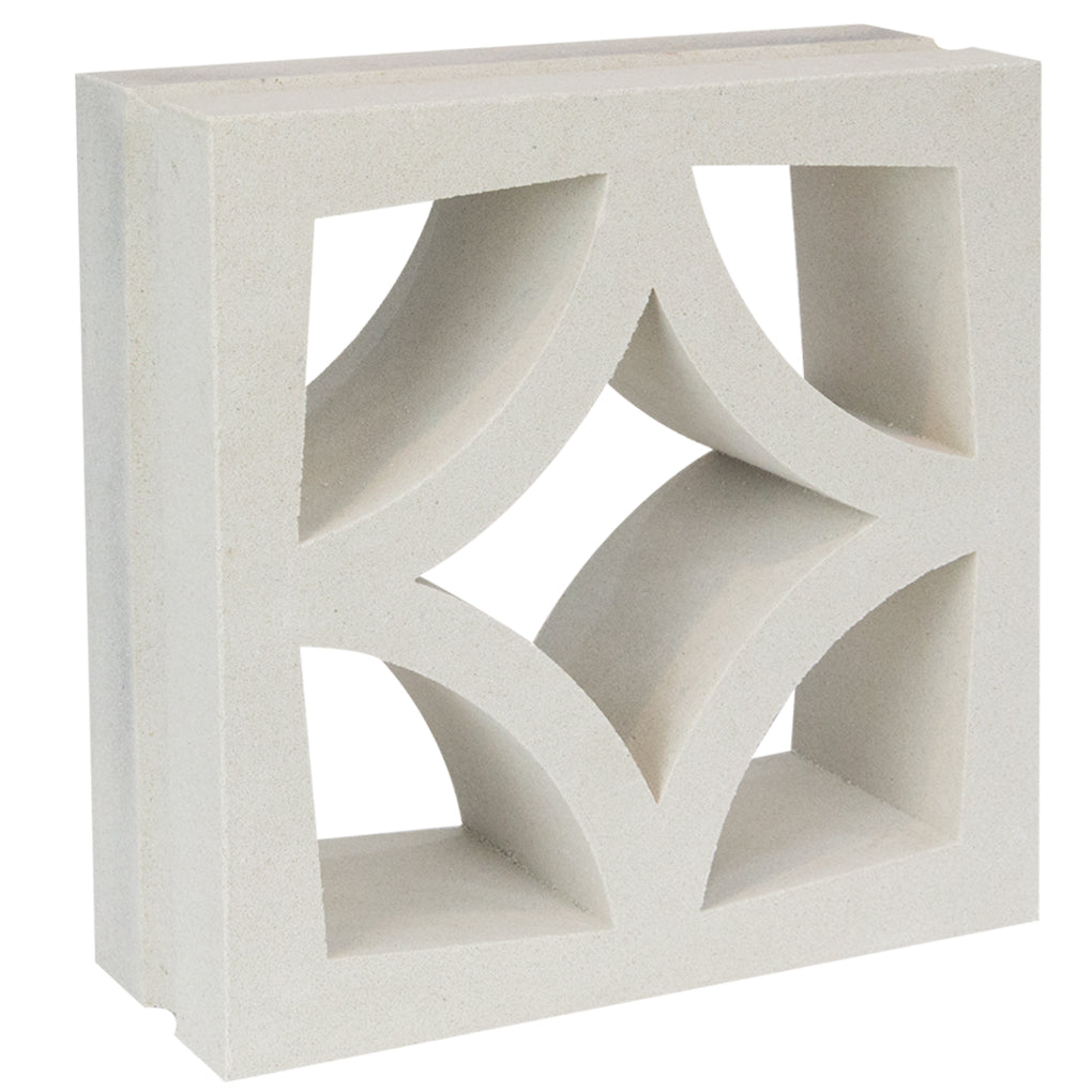 The Large Malta by New York Cement Tile is a white concrete screen block with curved cutouts creating a diamond pattern.