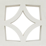 The Large Malta by New York Cement Tile is a white concrete screen with diamond-shaped openings for mid-century modern decor.