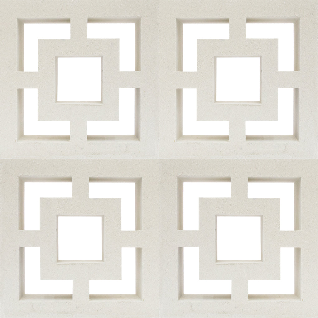 Four Large Tong blocks by New York Cement Tile in a 2x2 grid, white with geometric cut-outs on a white background.