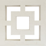 The Large Tong by New York Cement Tile is a decorative block with a square center and L-shaped cutouts, great for privacy screens.