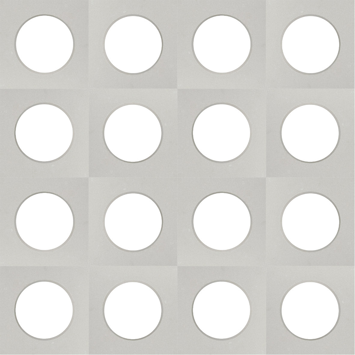 A grid of sixteen white circles forms the Large Tortie Sample by New York Cement Tile on a light gray textured backdrop.