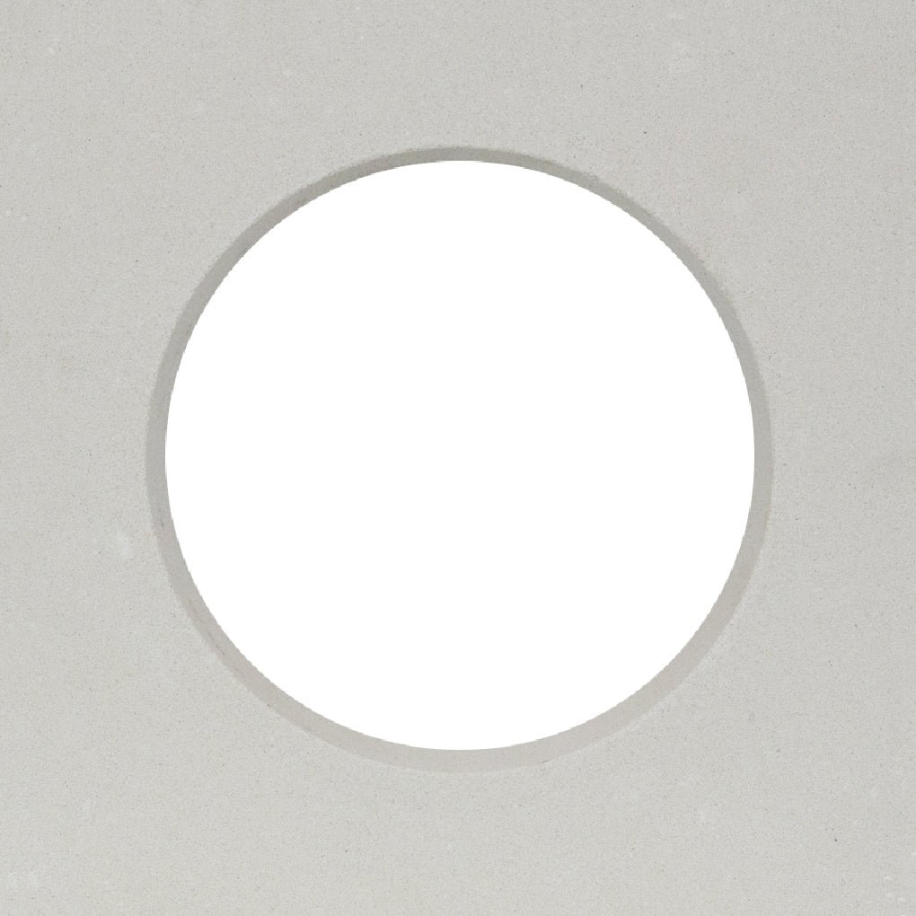 A large white circle, like a mid-century partition, highlights the Large Tortola Extra Sample by New York Cement Tile.