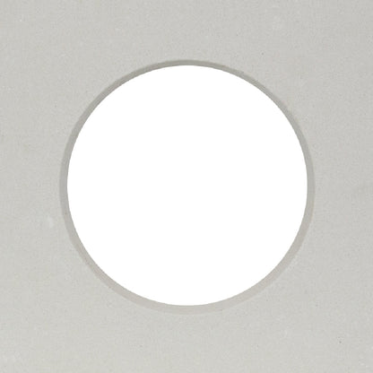 A large white circle, like a mid-century partition, highlights the Large Tortola Extra Sample by New York Cement Tile.