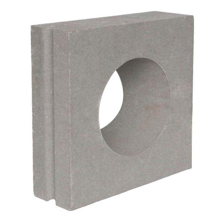 The Gada by New York Cement Tile is a square gray mid-century concrete screen with a large circular center hole.