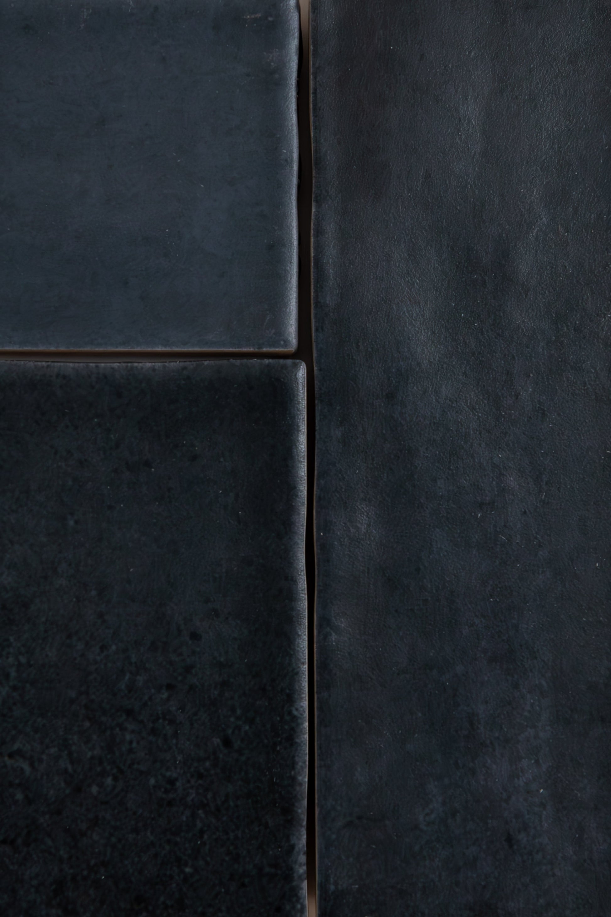 Close-up of four Lomond Blue, Extra Sample tiles by Cottage Ivy with matte texture and uneven edges in a rectangle layout.