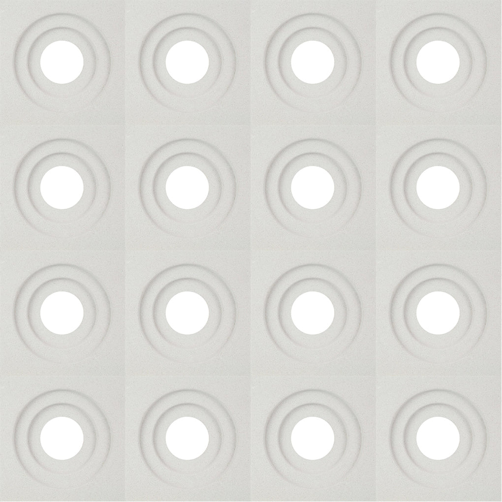 The Luzi Sample by New York Cement Tile features 16 recessed circles, inspired by breeze blocks for partitions and screens.