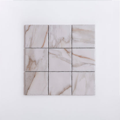 Nine Tosca Macchia Vecchia sample tiles arranged in a 3x3 grid on a plain white background.