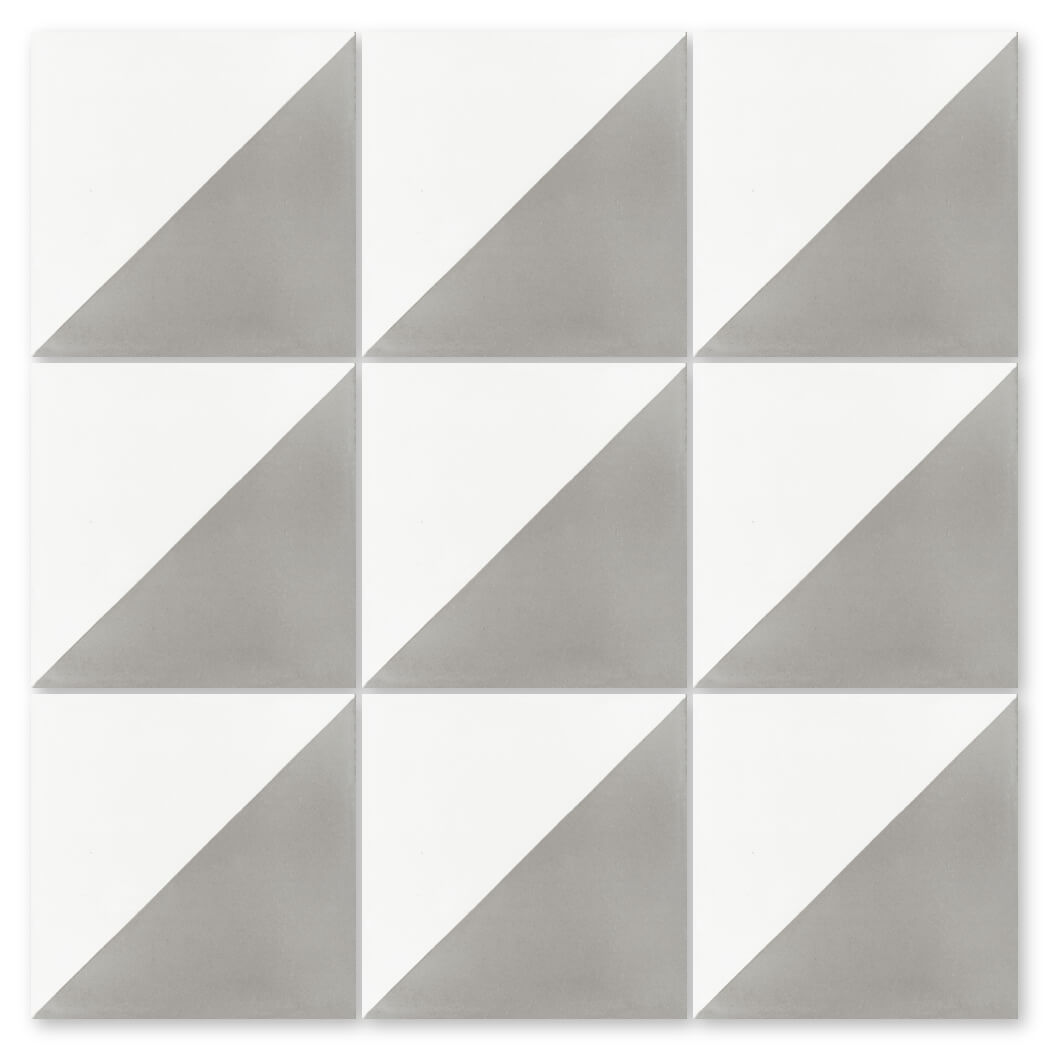 Nine N20-139 Soft Slate & White tiles by New York Cement Tile create a bold diagonal white and gray pattern.